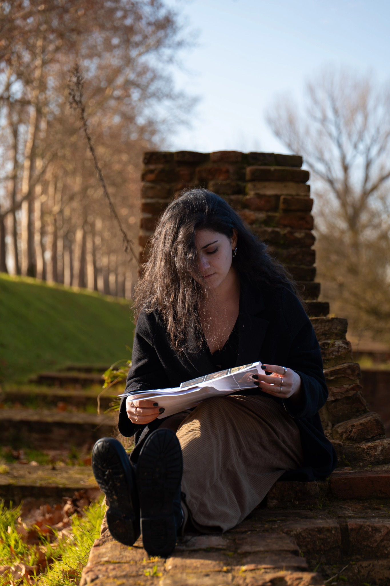Portrait against brick wall